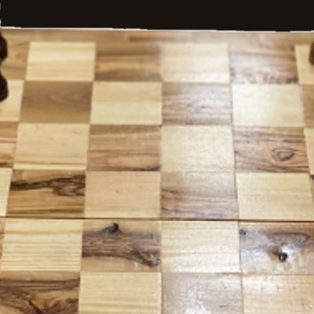 Close-up of Olive Wood Chess Set, Grand