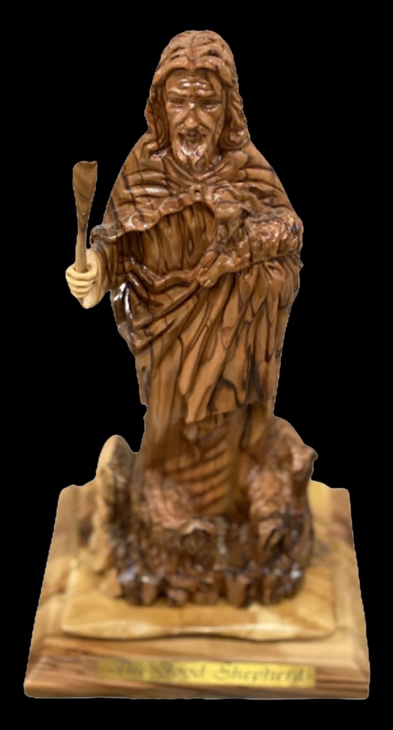 Olive wood carving of Christ as the Good Shepherd holding a raised staff