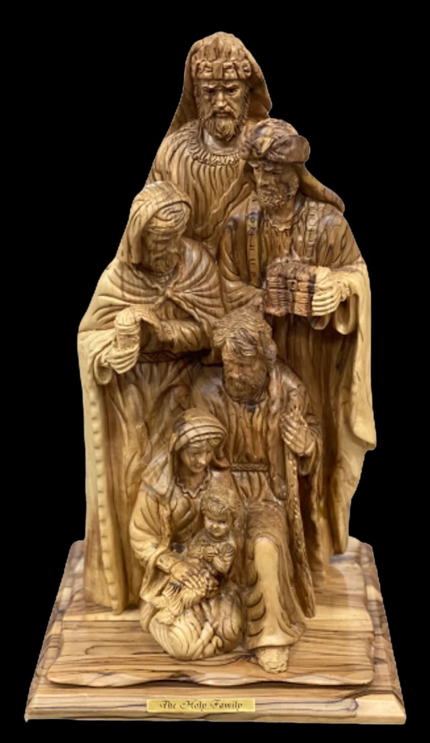 Tall olive wood carving of the Holy Family arranged in tiers on a carved base