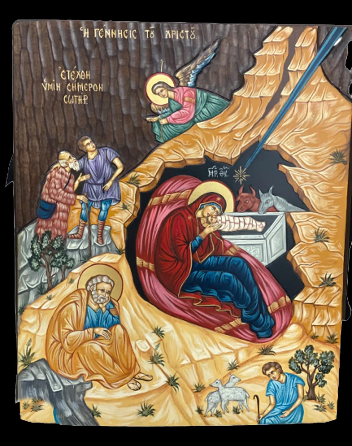 Hand-painted icon of the Nativity of Christ with Mary, the Child in the manger and shepherds
