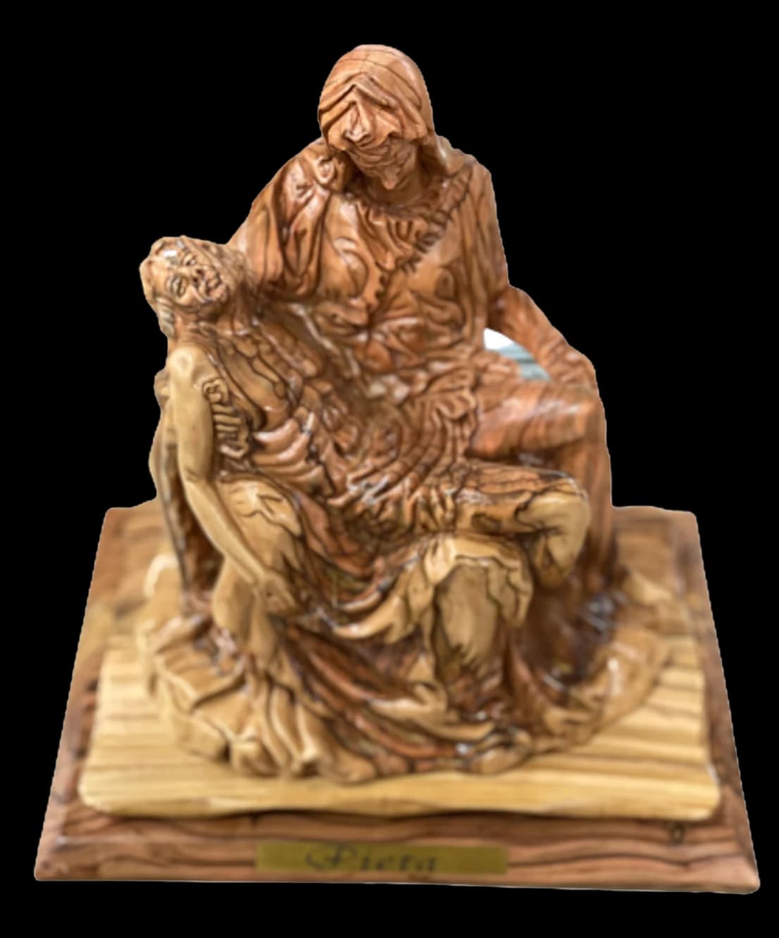 Olive wood Pietà: the Virgin Mary holding the body of Christ across her lap