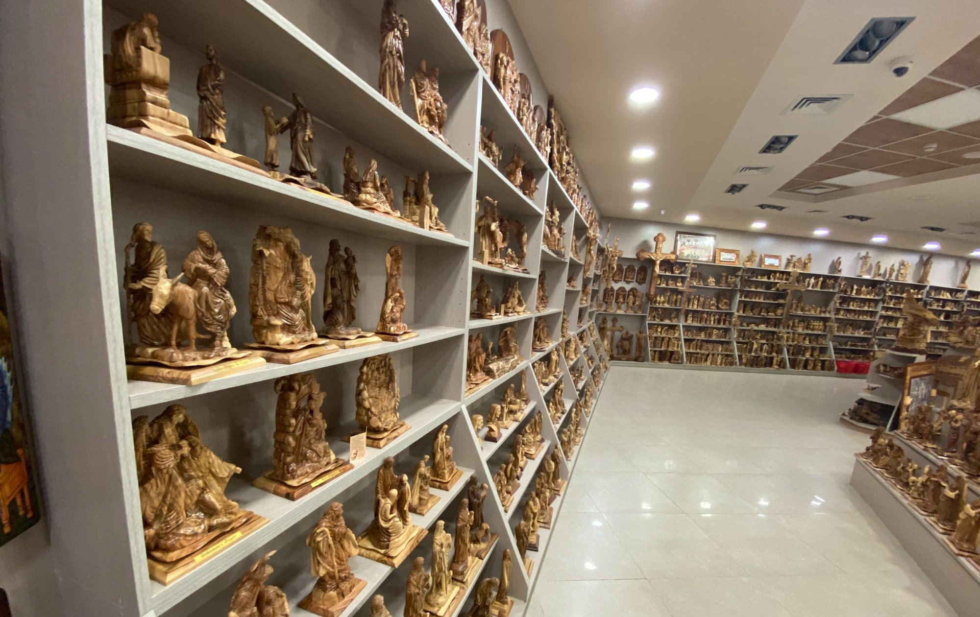 Shelves of olive wood figures